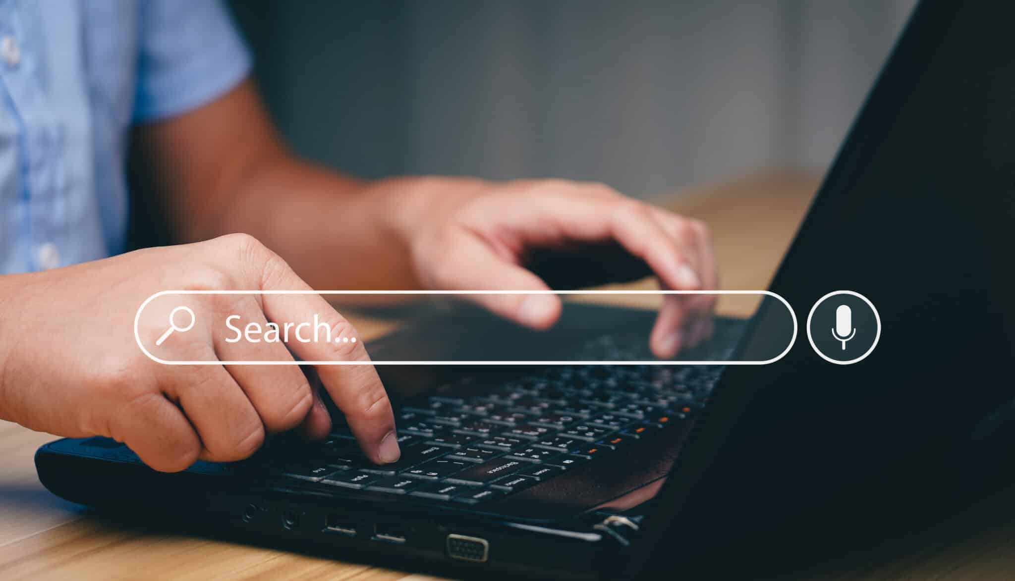 Search Engine Concept. Tools or programs for searching for information on the Internet. Men's hands use computers to find information using search engines and help grow online business.