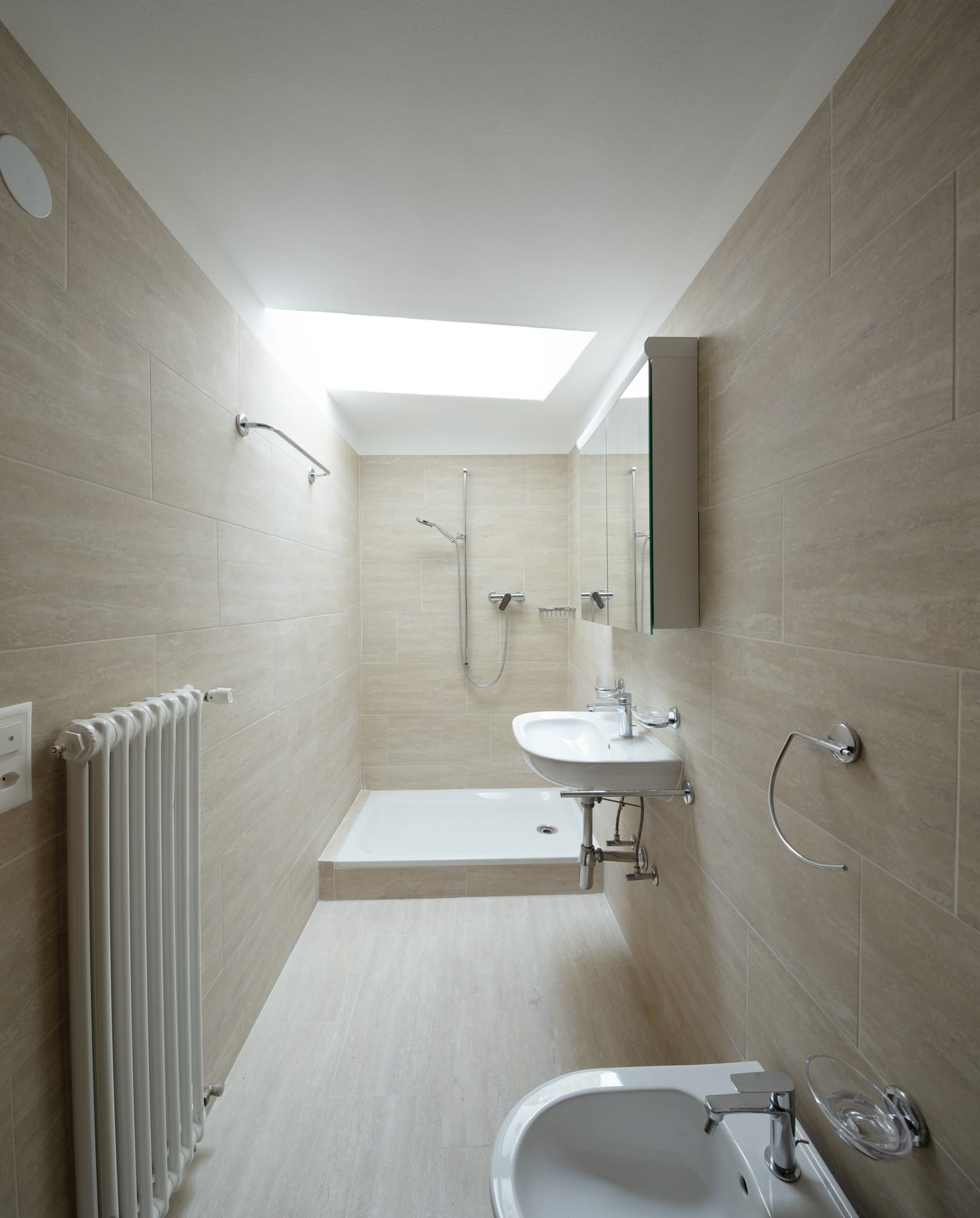Empty room with parquet and window overlooking the castle