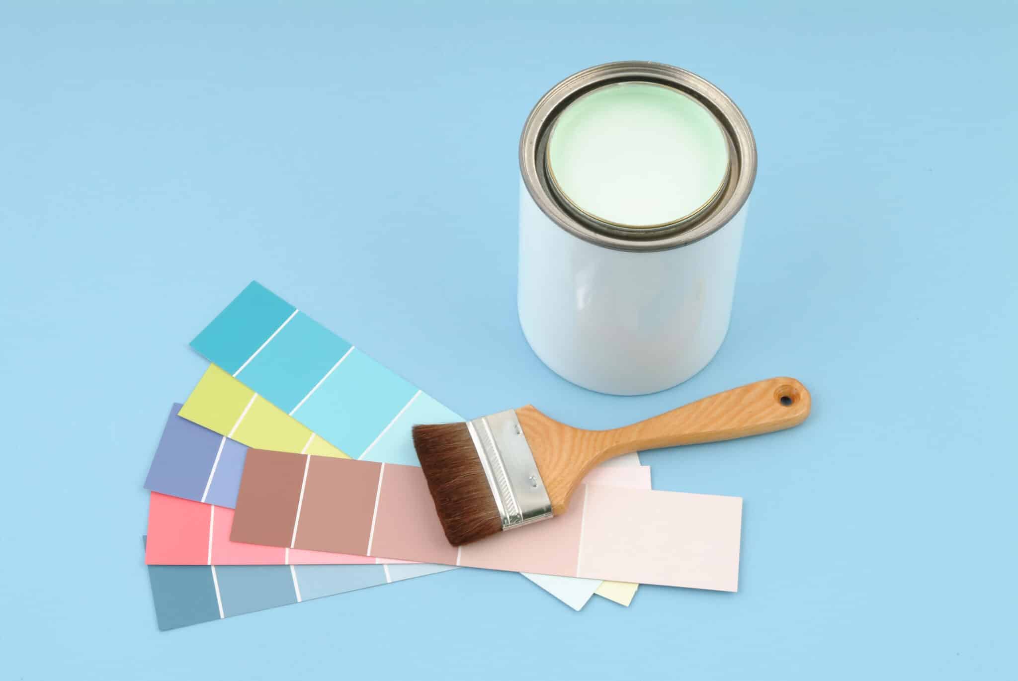 Paint can, brush and color swatches
