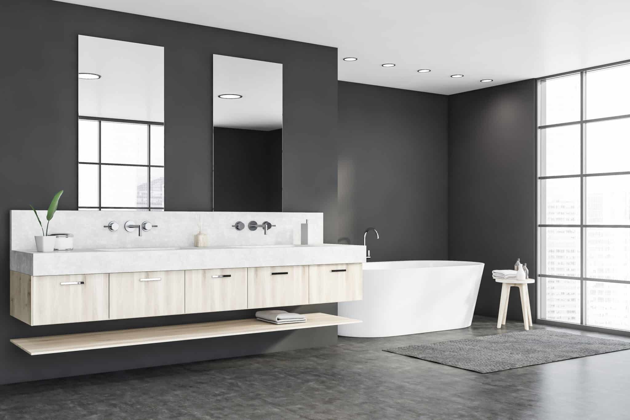 Panoramic gray bathroom corner, tub and sink