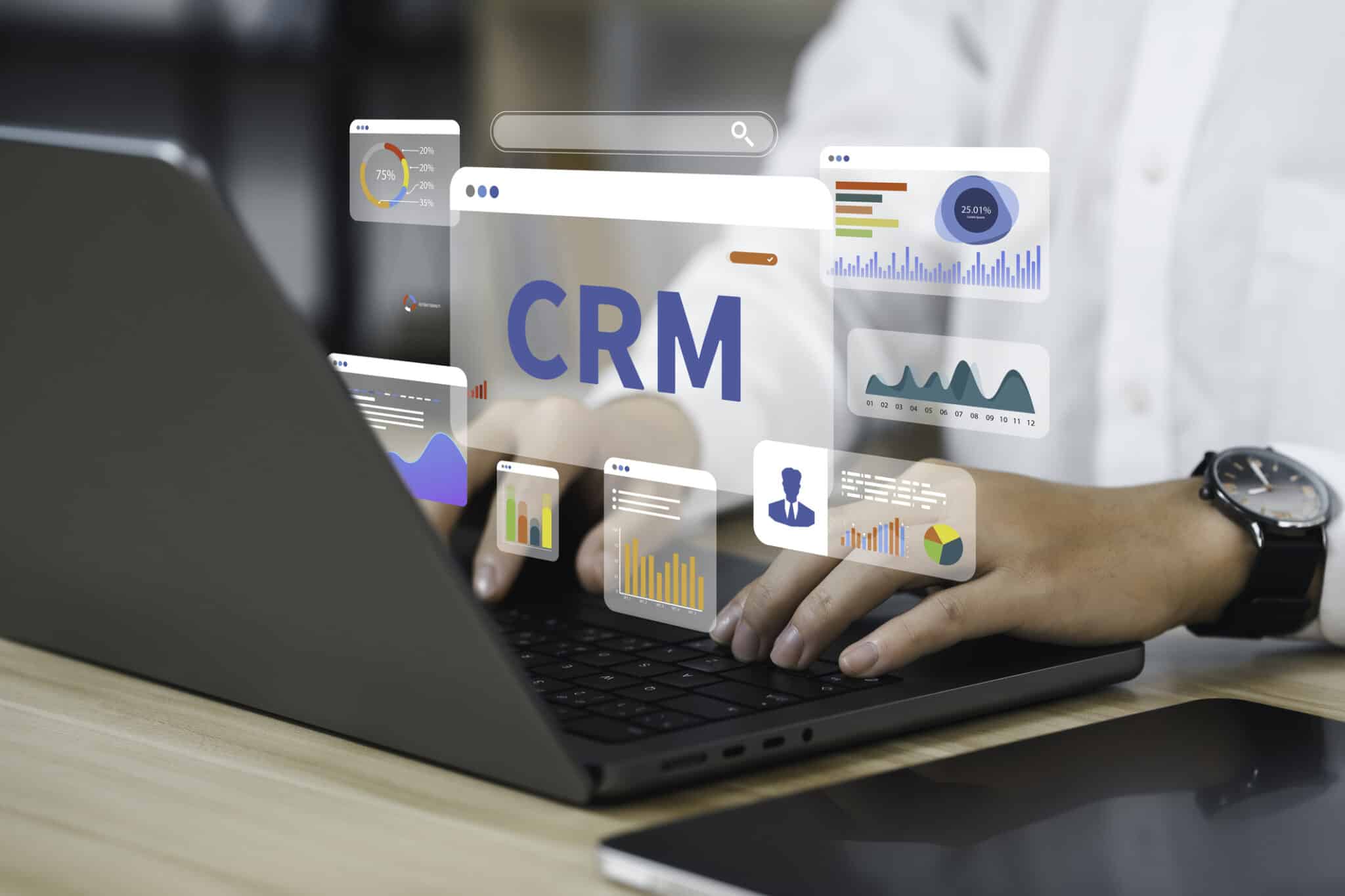 Businessman using a computer and dashboard CRM for Management Customer Relationship Management for business sales marketing system concept.CRM database analysis on Internet Technology